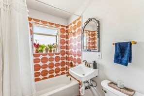 Jetted tub, hair dryer, towels, soap