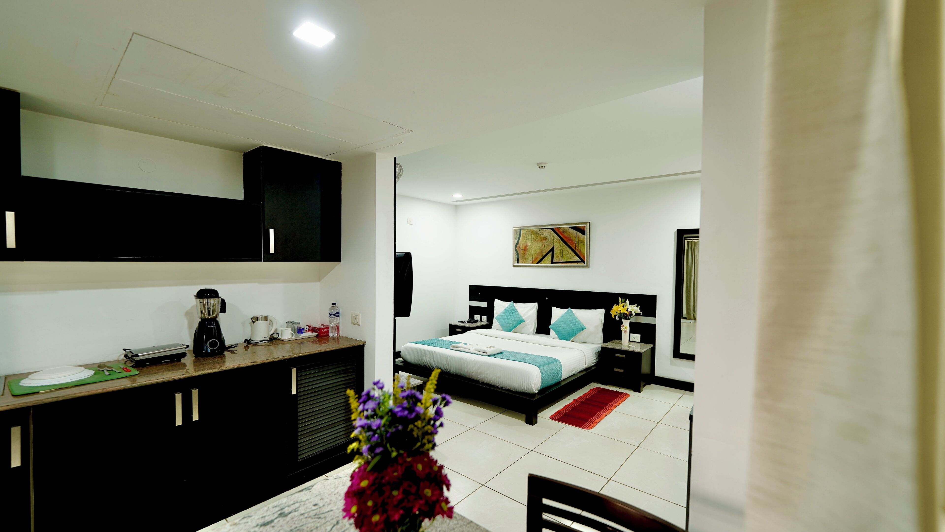 Habitación Deluxe, balcón | Tabla de planchar con plancha 