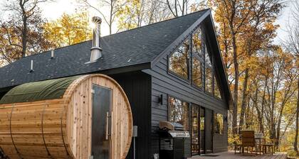Riverside Retreat: Unwind in a Cabin with Private Steam Sauna on the Pine River