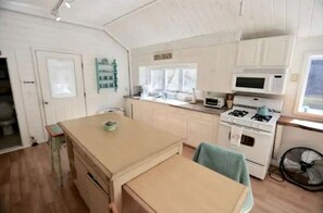 Fridge, microwave, oven, stovetop - Gorgeous Lakefront Cottage Nestled Amidst Trees in Meredith, New Hampshire (Meredith)