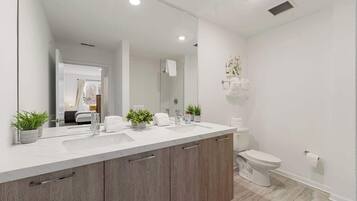 Shower, hair dryer, towels
