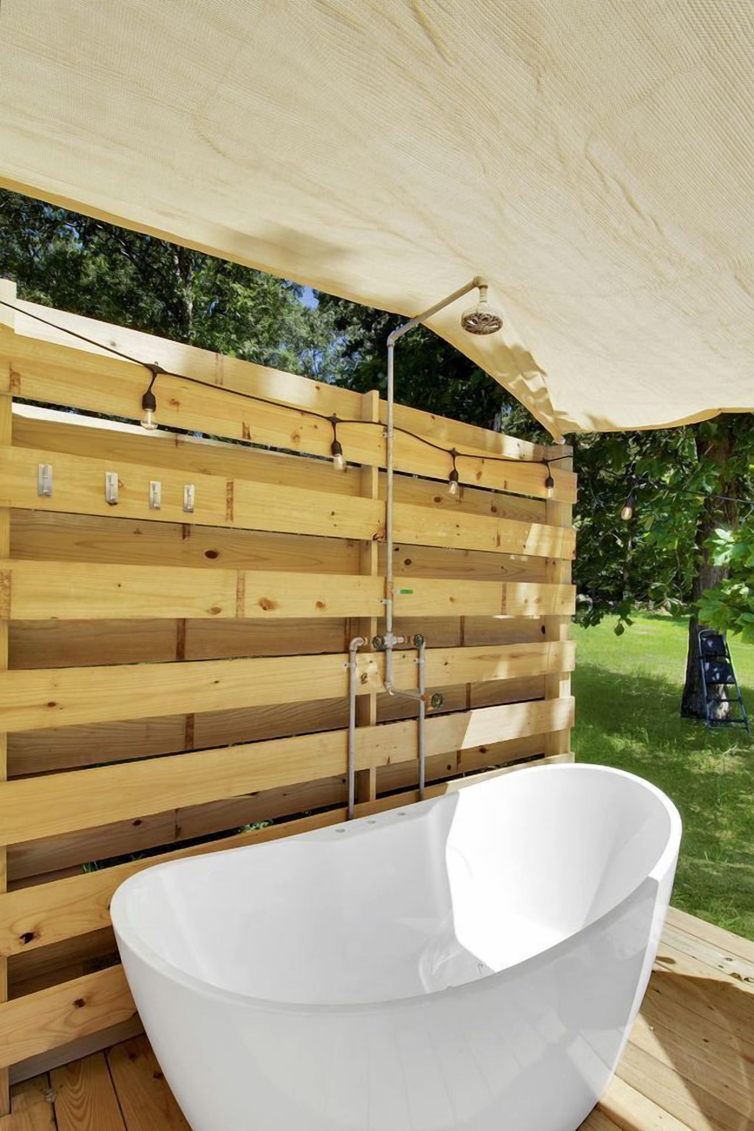 Jetted tub, hair dryer, towels, soap