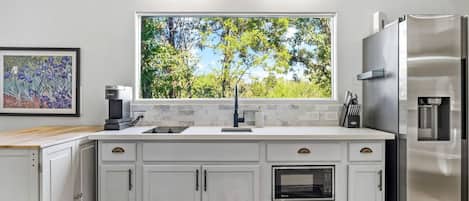 Fridge, microwave, stovetop, coffee/tea maker