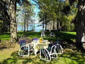 Outdoor dining - Secluded Cottage Rental on Lovely Lake near Rochester, New York (Dresden)