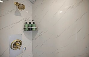 Jetted bath, towels, soap, shampoo