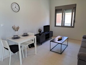 TV - Giannis Apartment is a bright, spacious, and fully functional home. (Afantou)