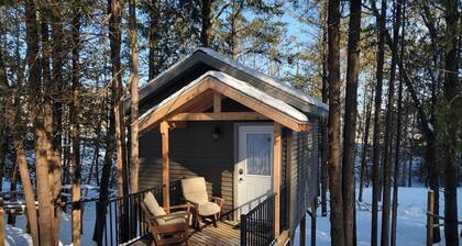 Cozy Up in this Cute Cabin Treehouse with Views of the Bluff Woodlands, Minnesota
