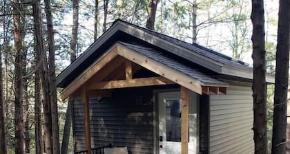 Cozy Up in this Cute Cabin Treehouse with Views of the Bluff Woodlands, Minnesota