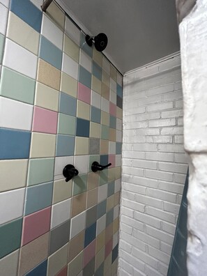 Shower, towels, soap, toilet paper