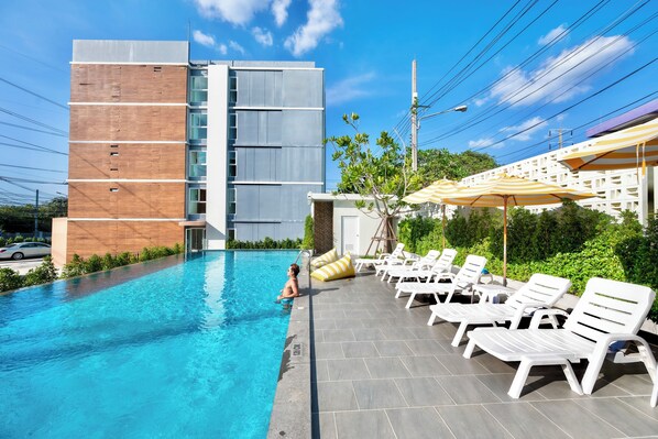 Outdoor pool, pool umbrellas, pool loungers