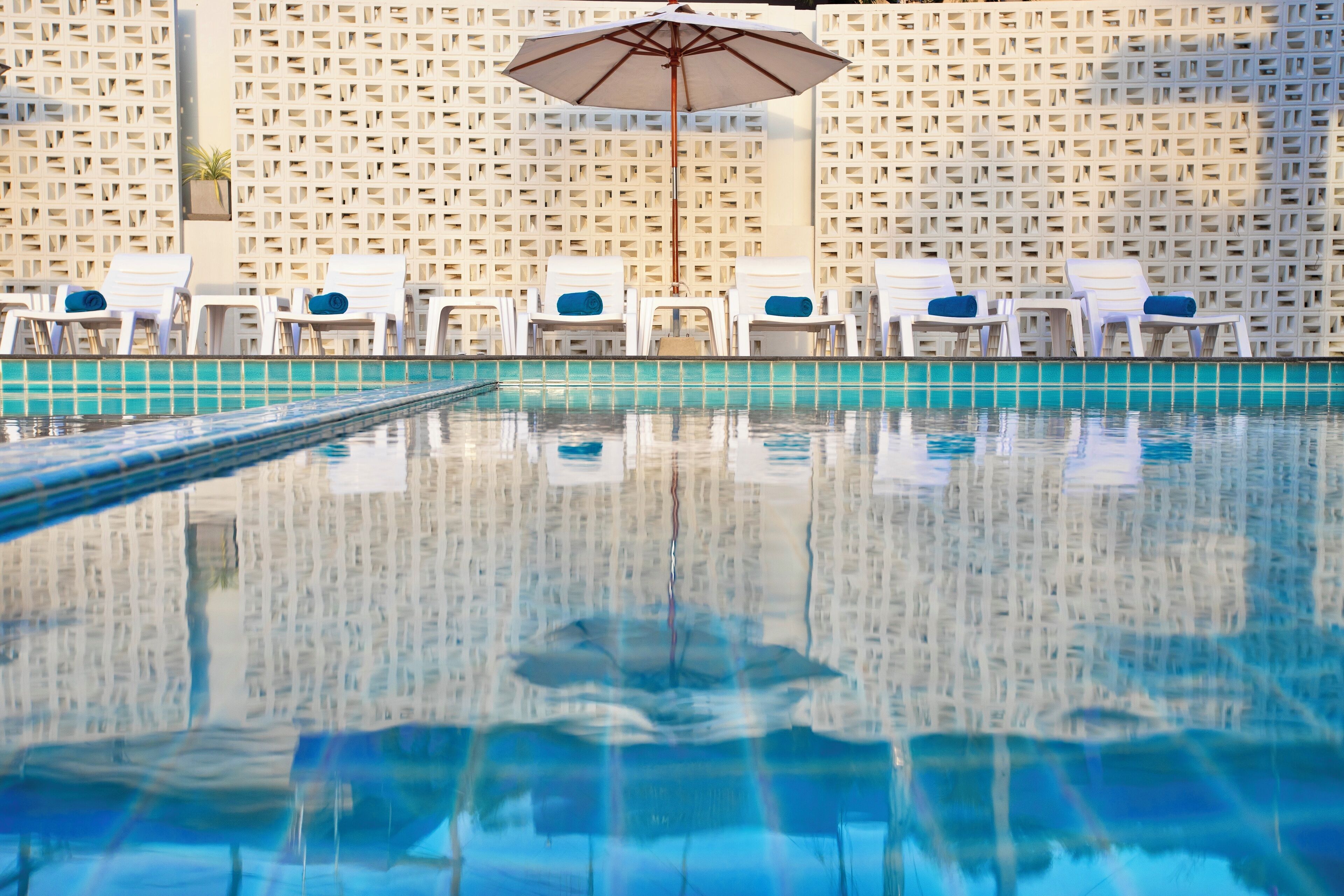 Outdoor pool, pool umbrellas, pool loungers