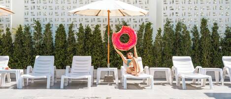 Outdoor pool, pool umbrellas, pool loungers