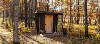 Cabin Charm by the Pine: Pet-Friendly Retreat in Mission Township's Riverside Haven
