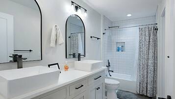 Hair dryer, towels, soap, shampoo
