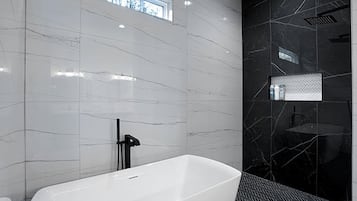 Jetted tub, hair dryer, towels, soap