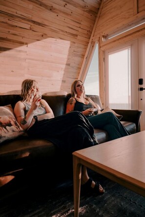 Living area - Rustic Off-Grid A-frame with Hot Tub and Sauna near the Grand Canyon for a Unique Escape in Williams, Arizona (Williams)