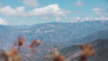 A mountainous landscape with a clear sky.