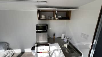 Coffee/tea maker, fridge, microwave, toaster