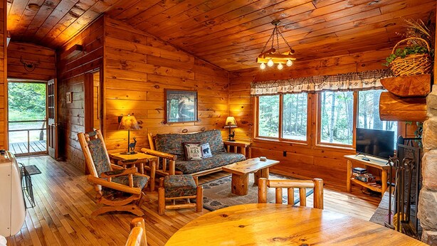 Fireplace - Getaways to Big Lake Minnesota in this Charming Log Cabin for 6 (Ely)