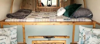 Rustic Sheep Wagon Glamping Retreat with Cowboy Ranch Views near Grand Tetons in Tetonia, Idaho
