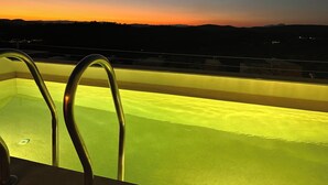 A swimming pool with metal railings, surrounded by a balcony with a view of a sunset over a hilly landscape. - Villa - Sleeps 8 - Near Beaches Golf and Polo (San Roque)