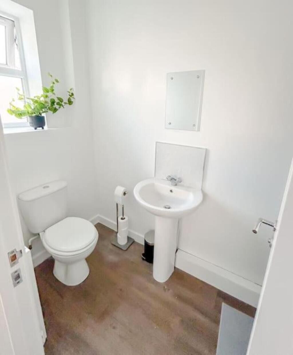 Shower, hair dryer, towels, toilet paper