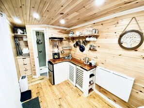 Fridge, stovetop, coffee/tea maker, cookware/dishes/utensils - Elevated Getaway: Exclusive Tiny House with Hot Tub and Deck Views in Todd, NC (Todd)