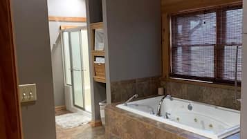 Jetted tub, hair dryer, towels, soap
