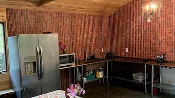 Fridge, stovetop, coffee/tea maker, cookware/dishes/utensils