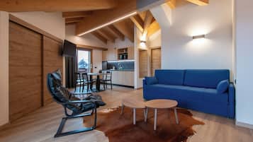 Deluxe Apartment, 1 Bedroom, Terrace | Living area | Flat-screen TV