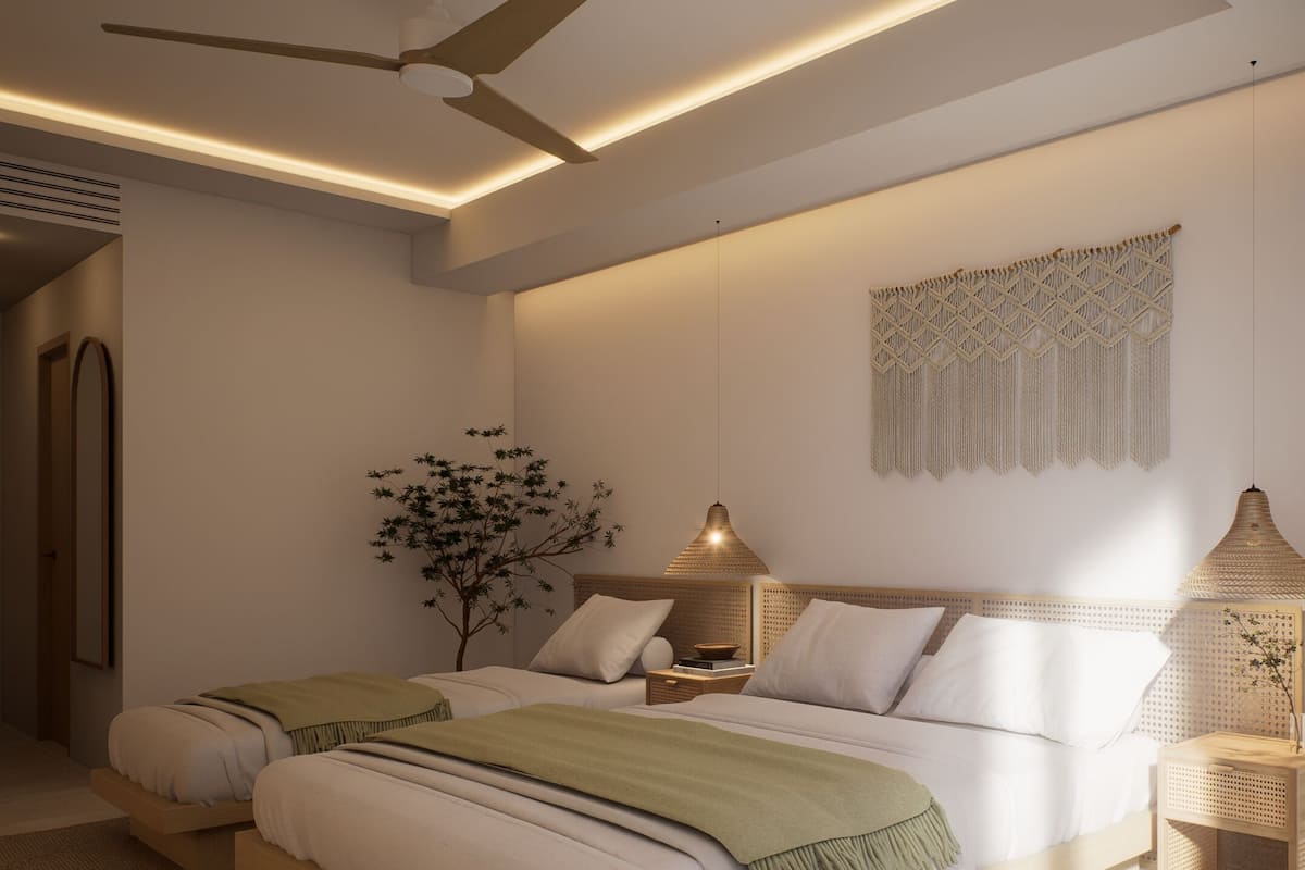A modern bedroom with a large bed, bedside tables, a ceiling fan, and a wall-mounted macrame piece.