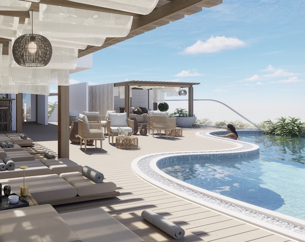 Outdoor pool, pool umbrellas, sun loungers