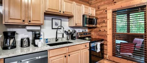 Coffee/tea maker, fridge, microwave, oven