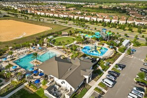 A resort with a large swimming pool, a water park, and a beach area. - 7BR Lakeview Villa + Heated Pool | 15min to Disney (Kissimmee)