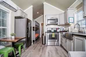 Fridge, microwave, stovetop, coffee/tea maker