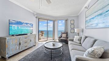 Signature Condo, 2 Bedrooms, Balcony, Beach View | Living room | 32-inch Smart TV with satellite channels
