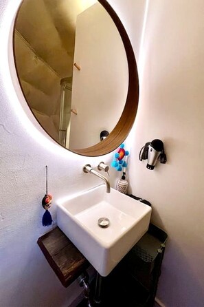 Hair dryer, towels, soap, shampoo