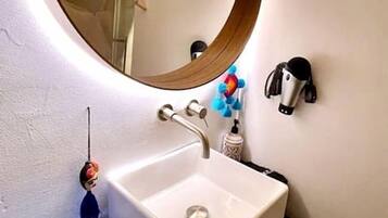 Hair dryer, towels, soap, shampoo