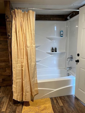 Jetted tub, hair dryer, soap, shampoo