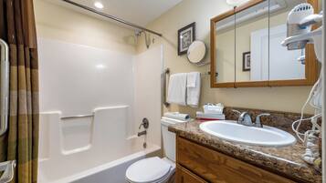 Hair dryer, towels, soap, toilet paper