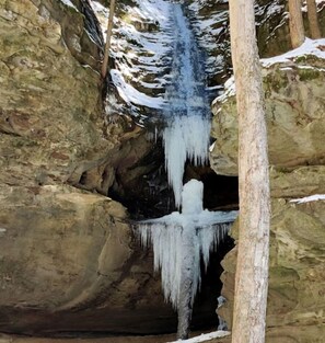 A cave with icicles hanging from the ceiling and walls. - Group Spacious Cabin with Hot-Tub and Picnic Areas in Ohio (Rockbridge)