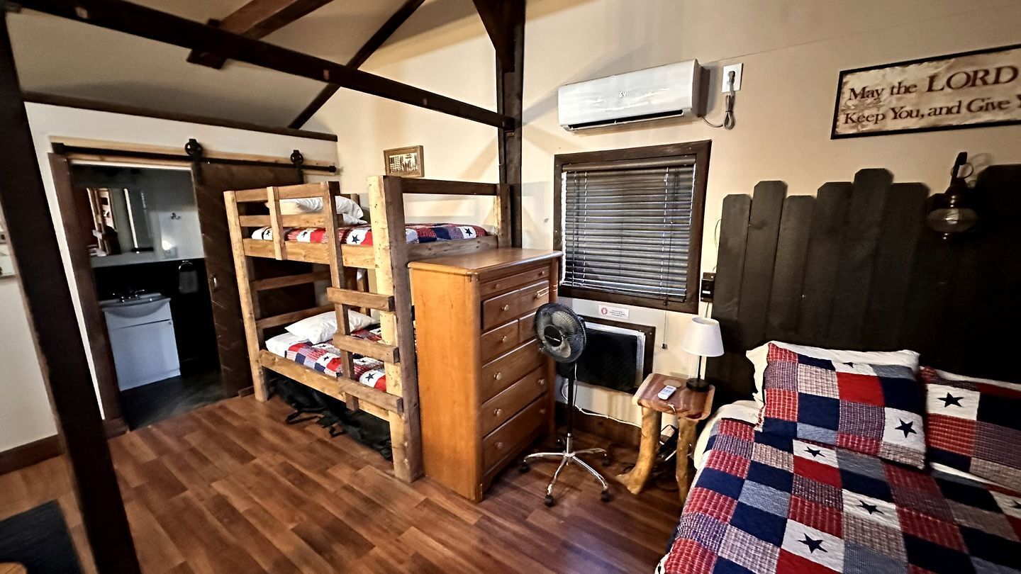 1 bedroom, desk, iron/ironing board, travel crib