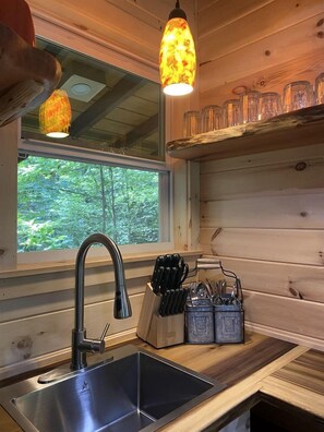 Fridge, microwave, coffee/tea maker, toaster