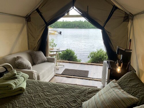 Pet-Friendly Glamping Vacations at this Waterfront Safari Tent in Naples, Maine