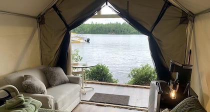 Pet-Friendly Glamping Vacations at this Waterfront Safari Tent in Naples, Maine