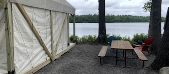 Pet-Friendly Glamping Vacations at this Waterfront Safari Tent in Naples, Maine