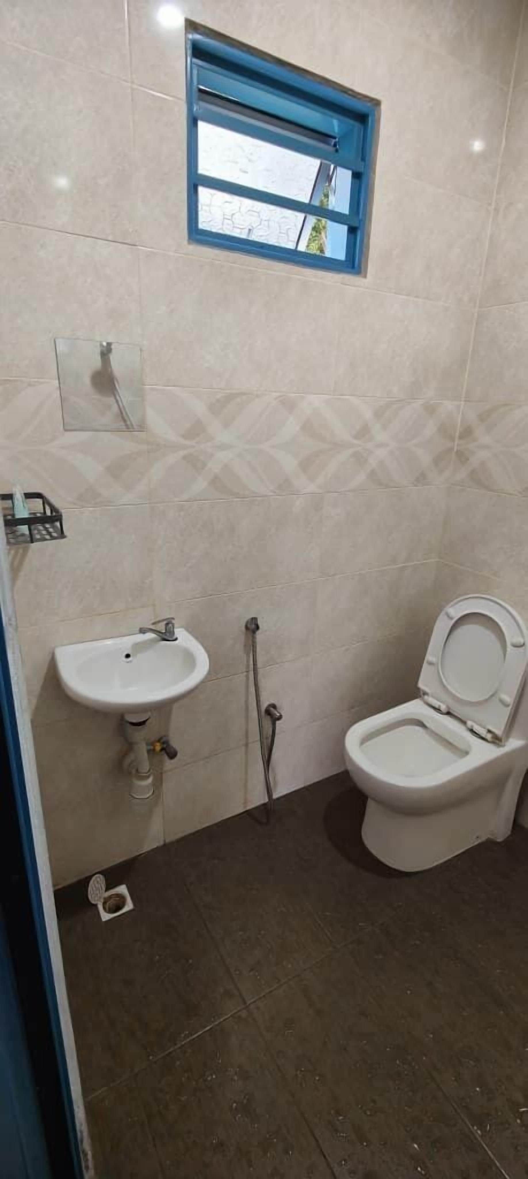 Shower, towels, soap, toilet paper