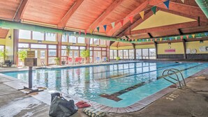 An indoor swimming pool with wooden beams, clear lane dividers, and a sign indicating a reserved lane. - 4 Mi to Dtwn: Pagosa Springs Gem w/ Mtn Views! (Pagosa Springs)