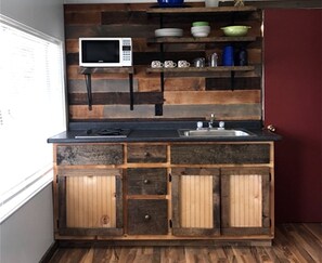 Fridge, microwave, stovetop, coffee/tea maker