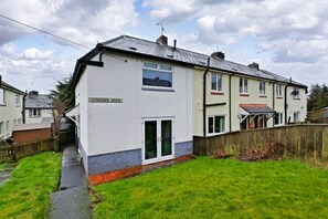 A two-story residential building named HYDENSIDE GROVE with a visible front door and windows. - Toast Stays - Hydenside House (Consett)